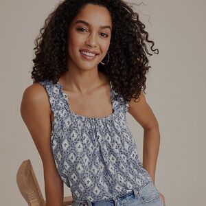 Floral Ruffle Strap Swing Tank
Тор